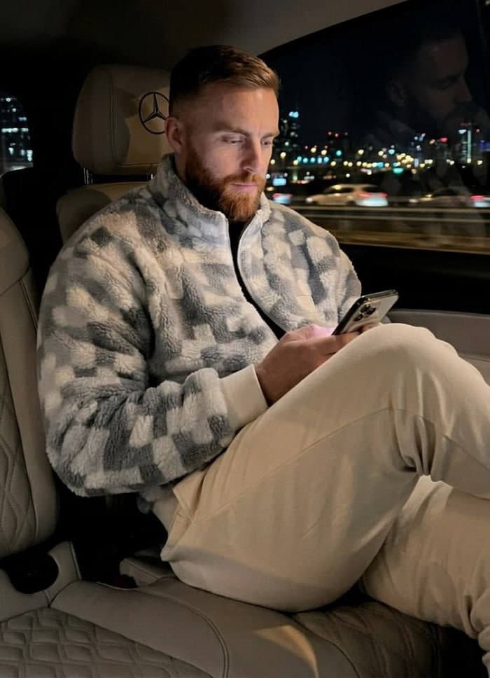 Ethan in a Mercedes at night