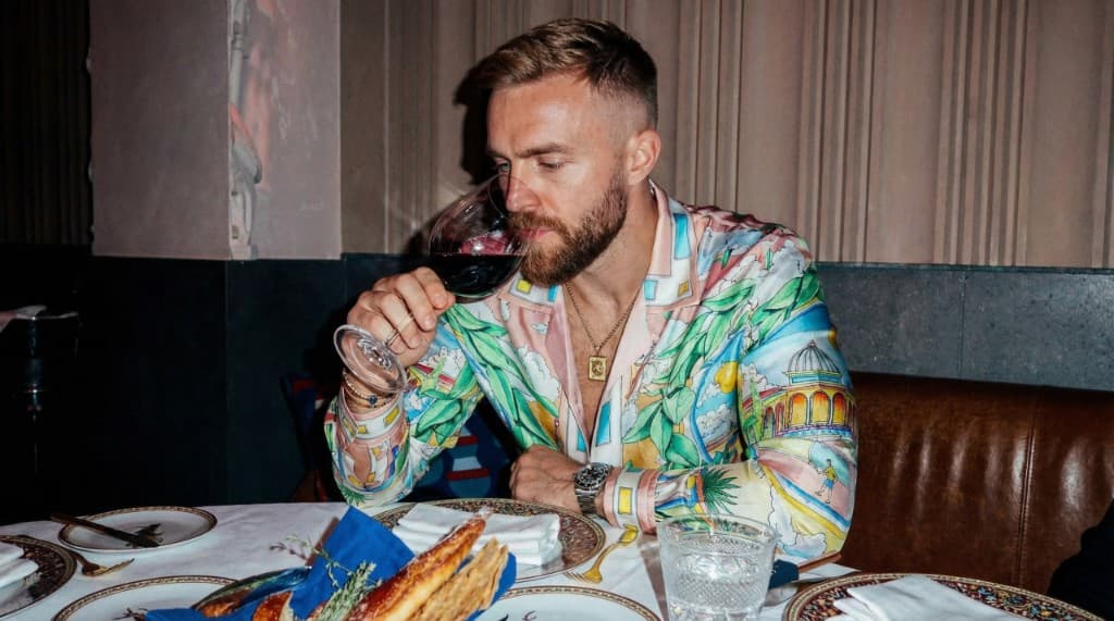 Ethan at dinner with wine
